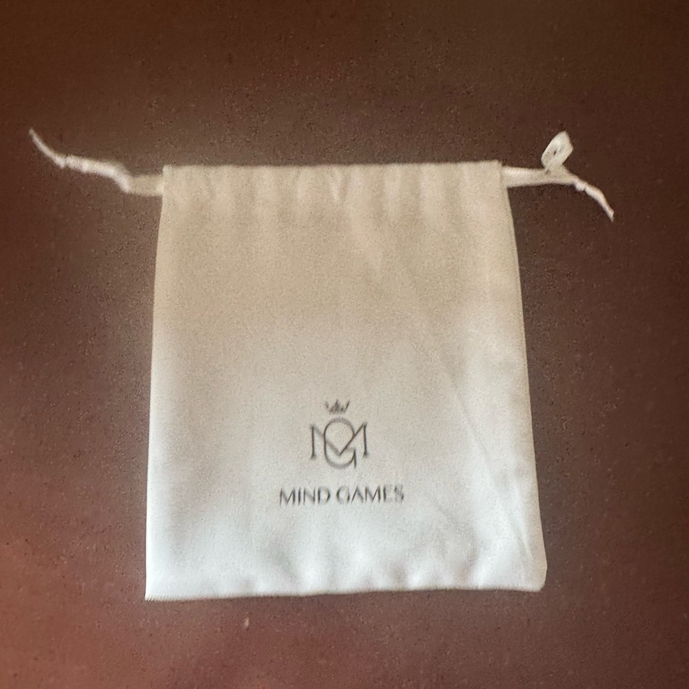 New Mind Games pouch